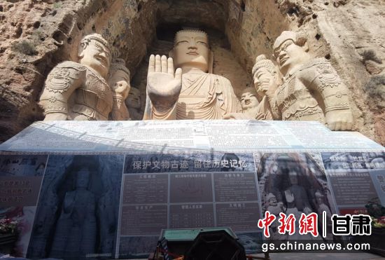 時下，中國“石窟鼻祖”天梯山石窟第13窟大佛足部與局部危巖體搶救性保護項目正在施工。圖為施工現(xiàn)場。陳曉斌 攝